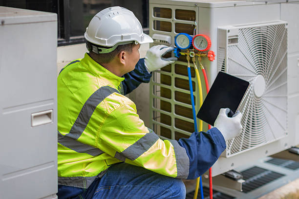 Professional Air Duct Cleaning technician working in Orlinda, TN
